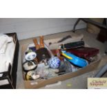 A box of miscellaneous items to include a spelter