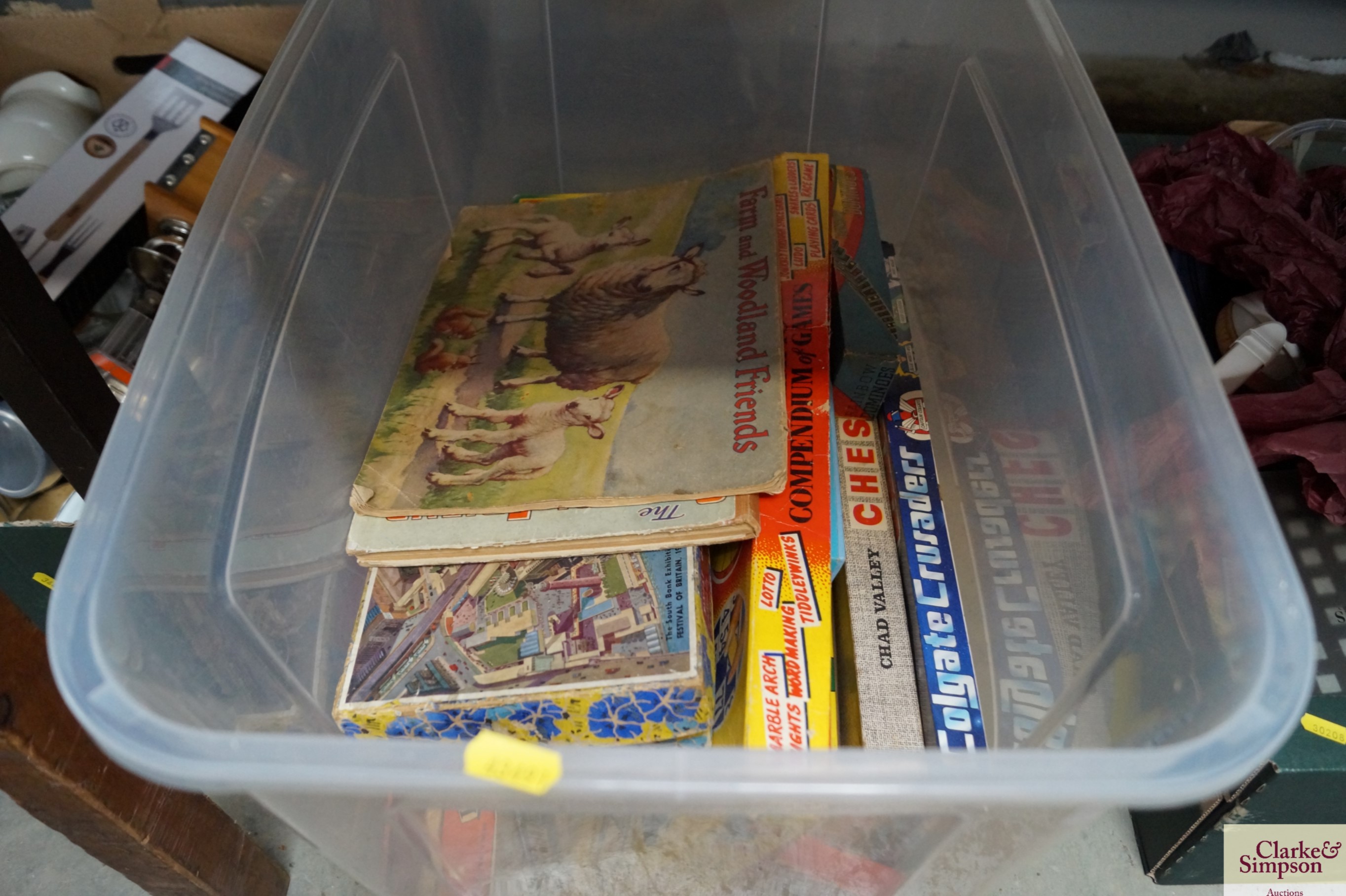 A box containing various vintage games