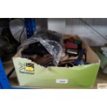 A box containing lady's handbags; lady's gloves; e