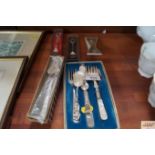 A quantity of boxed cutlery etc.