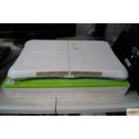 A Wii Fit board with original box