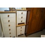 A pair of light oak topped bedside chests fitted t