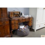 A walnut dressing table