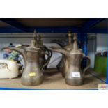 Six Eastern brass coffee pots