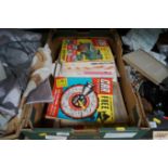 A box containing vintage magazines etc