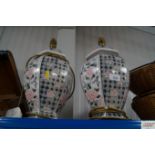 A pair of Oriental decorated table lamps lacking s