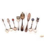 Various silver and white metal spoons etc.