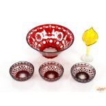 A Bohemian ruby glass bowl; three smaller bowls an