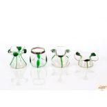 Three Art Nouveau style green tinted glass posy va