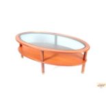 A G-plan design teak two tier oval coffee table