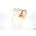 A Clarice Cliff design baluster water jug with lea