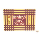 A painted wooden "Hershey's" sign, 54.5cm x 78cm