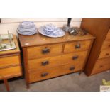 An early 20th Century oak chest fitted two short a