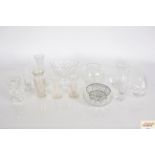 A collection of various cut glass and other vases