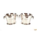 A pair of plated oval Champagne coolers with ring