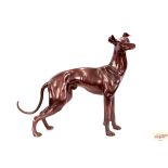 A bronze figure of a greyhound, 84cm high x 100cm