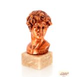 A coppered classical bust on onyx base. 23cm high