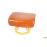 A modern brown leather upholstered Eames style sto