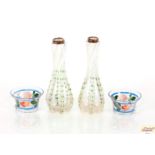A pair of Art Nouveau twist glass posy vases with