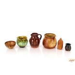 A brown glazed Studio pottery jug; a small brown b