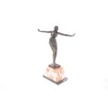 An Art Deco style bronze figure of a dancing girl