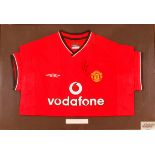 A framed Manchester United shirt signed by Ruud Va