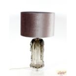 An Art Glass lamp with smoked raised decoration an