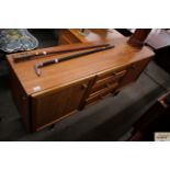 A G-plan style teak sideboard fitted three central