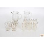 A five piece glass lemonade set, with gilt spot decorat