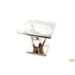 A polished metal and marble effect topped occasional table, 60cm wide x 56cm high