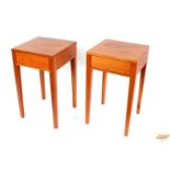 A pair of Heals bedside cabinets with sprung drawe