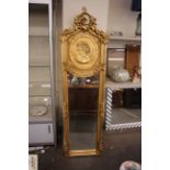 A pair of Art Nouveau style gilt wood pier mirrors