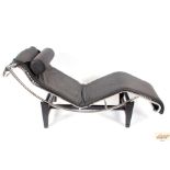 A chrome, black leather and metal chaise longue