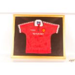 Manchester United a framed shirt with Sharp Sponso