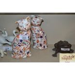 A pair of early 20th Century porcelain cats decora
