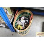 A wicker bag containing stuffed toys