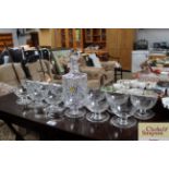 A quantity of etched glass sundae dishes together