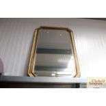 An octagonal bevel edged wall mirror