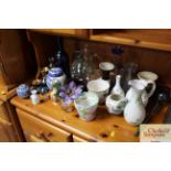 A collection of various vases; jugs; sundry items