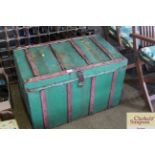 An antique wooden and metal bound storage box