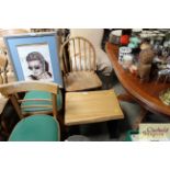 A Ercol chair together with an oak coffee table