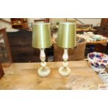 A pair of table lamps and shades