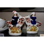 A pair of Victorian Staffordshire figures of child