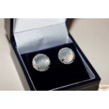 A pair of Sterling silver moonstone and diamond te