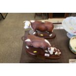 A Doulton model of a Hereford bull and a Doulton m