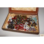 A box of assorted and vintage beads