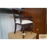 A miniature Victorian style bar back elbow chair