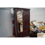 An early 20tyh Century mahogany two door wardrobe