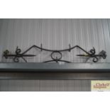 A wrought iron kitchen hanger