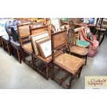 Three oak cane seated spindle back chairs